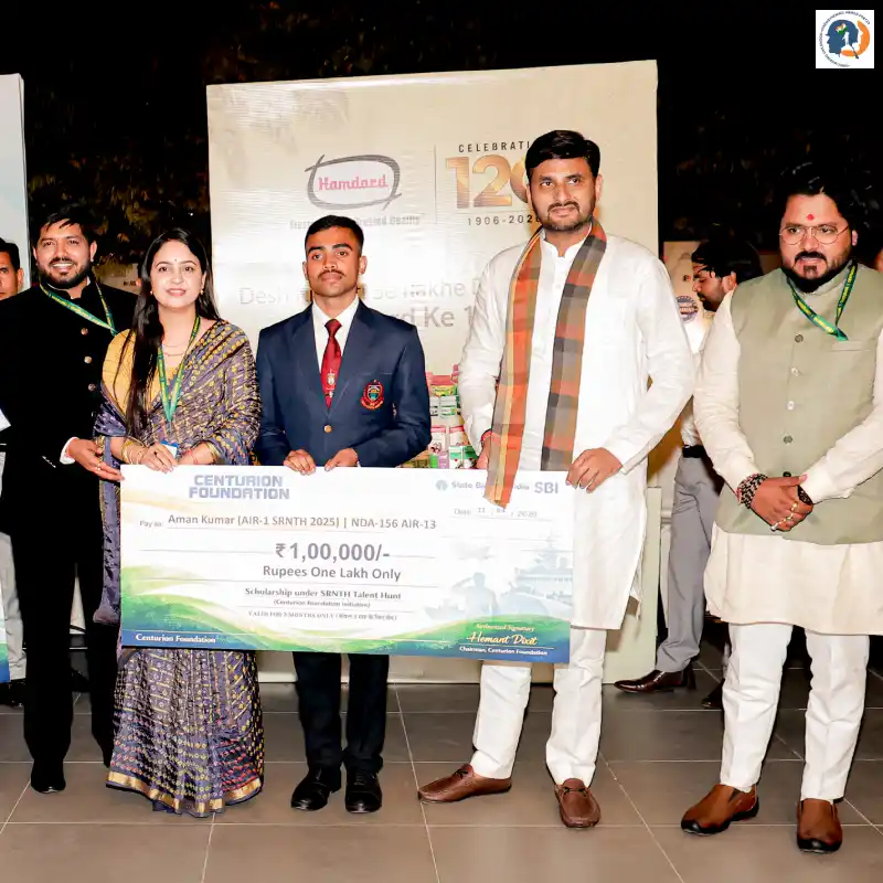 Shishir Dixit Sir, Gurkirat Kaur mam, Son of Honourable Defence Minister Dr. Neeraj Singh, and Hemant Dixit Sir honouring SRNTH AIR 1 Aman Kumar at Times Samman 2026.